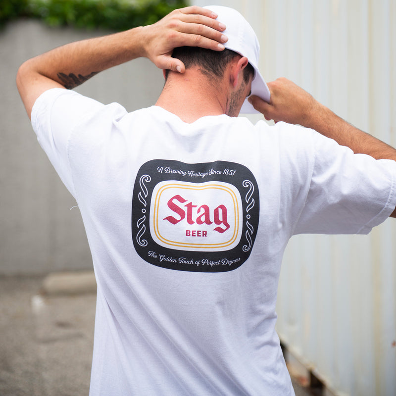 back of white t-shirt with Black Stag Beer Badge on male model 